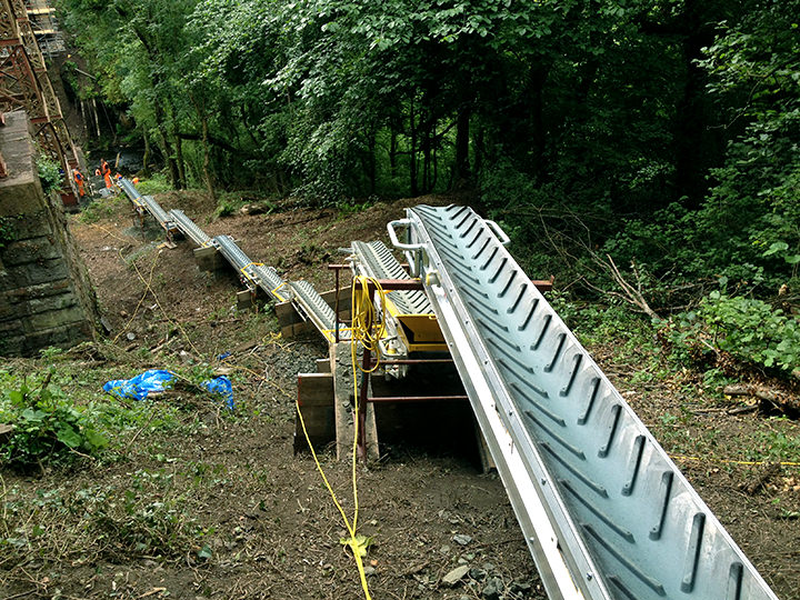 With small conveyor belts, you can dig out plots faster. Also protects the site from excavator traffic.
