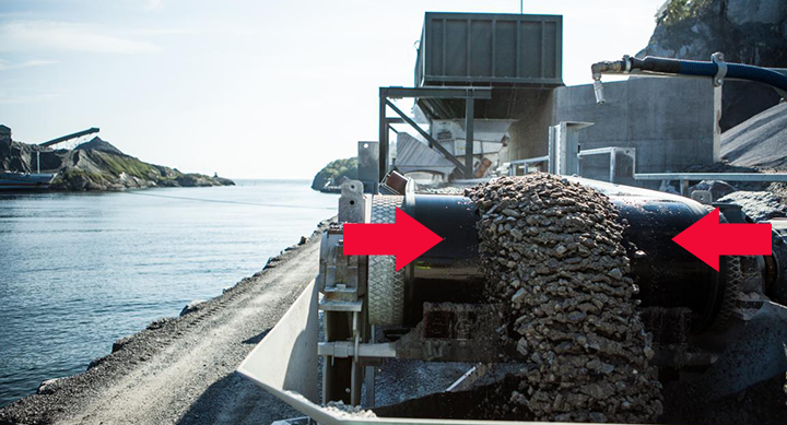 Transshipment point where mass is transferred from one carrier to another.